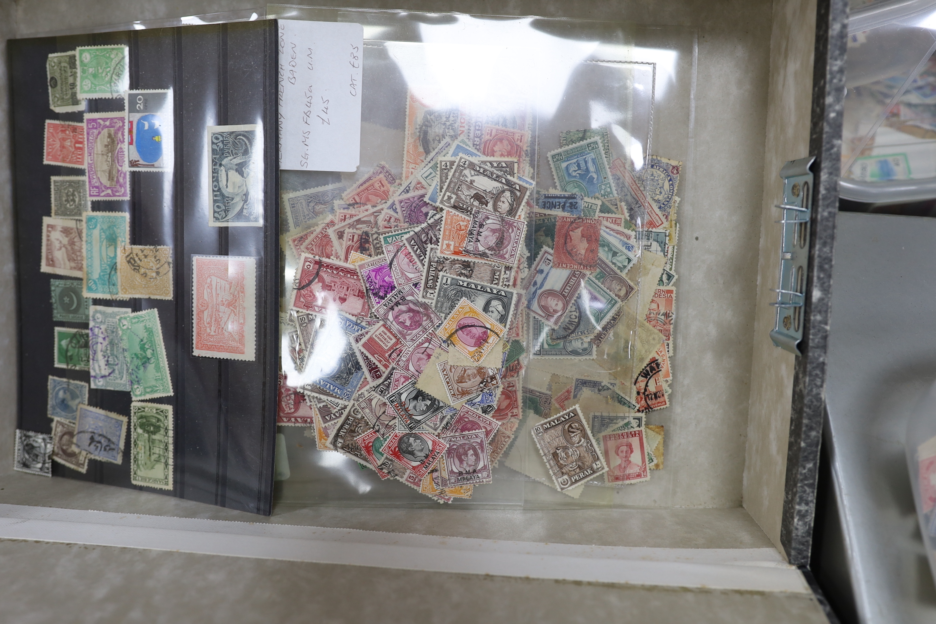 A very large quantity of stamps, some arranged in albums